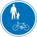 自転車および歩行者専用の標識。この標識がある場合は、自転車も歩道を通行することができます。